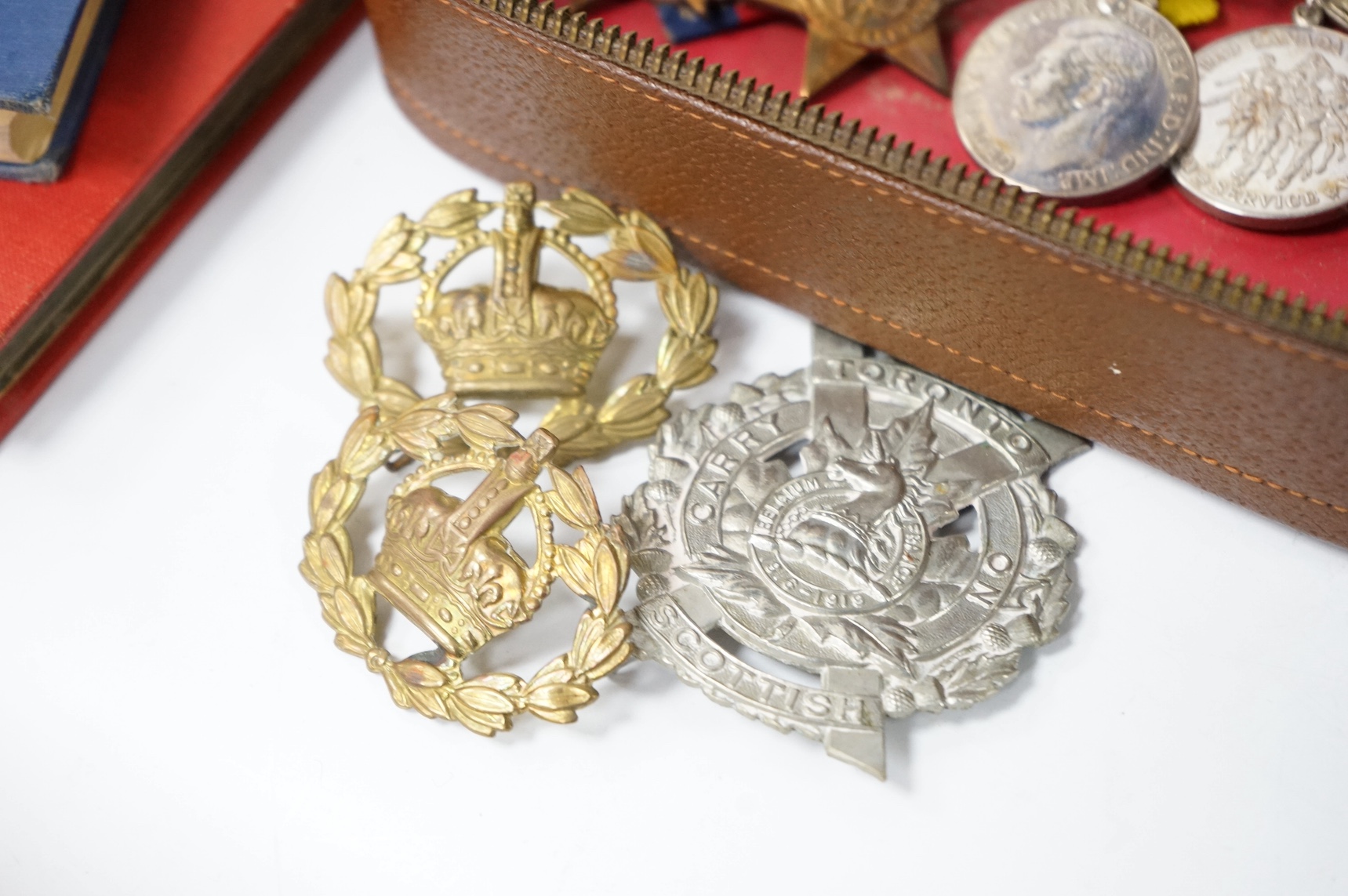 A WWII Canadian medal group awarded to E.B. Ash, a member of the Toronto Scottish Regiment, comprising of the 1939-1945 Star, the France and Germany Star, the Defence Medal, the 1939-1945 Canada Voluntary Service Medal w